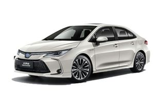 A white Toyota Corolla sedan.