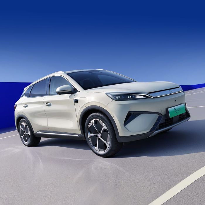 A light - colored BYD Yuan Plus electric SUV parked on the road.