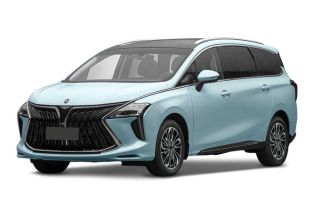 A light blue MPV with a bold front grille and panoramic sunroof is showcased against a plain background, highlighting its modern and spacious design.