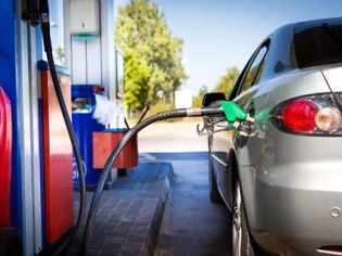 Cars refueling at a gas station