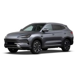 A gray BYD SUV, presented at a dynamic angle against a plain white background, highlighting its modern, sleek design and stylish alloy wheels.