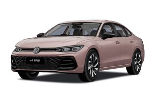 A stylish pink Volkswagen sedan with a sleek design.