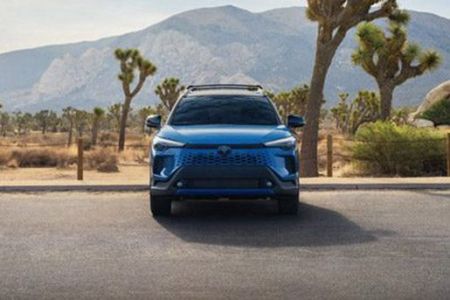 Bold blue Toyota SUV: rugged design, reliable performance, and adventure-ready for desert landscapes.