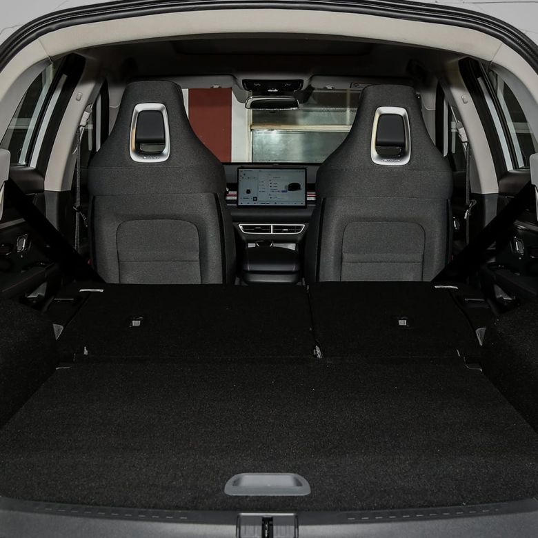 Trunk space of a car with seats folded down.