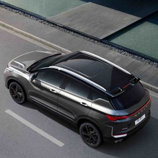Top view of Geely BinYue L SUV on the road.