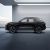 A black Jetour Dsashing in a modern, minimalist indoor space.