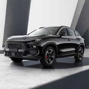 A black Jetour Dashing SUV in a modern, minimalist space.