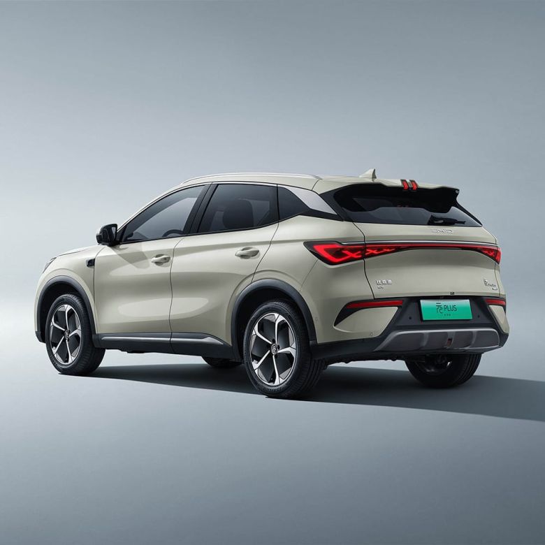 Side and rear view of a light-colored BYD Yuan Plus electric SUV.