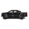 Side view of a black pickup truck with off - road tires, isolated on a white background.