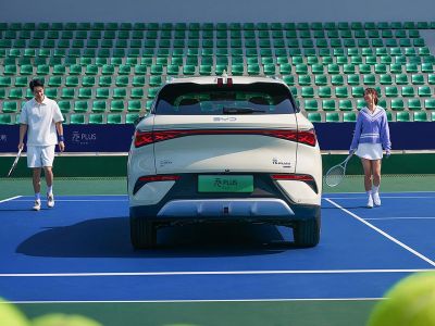 A light - colored BYD Yuan Plus electric SUV.
