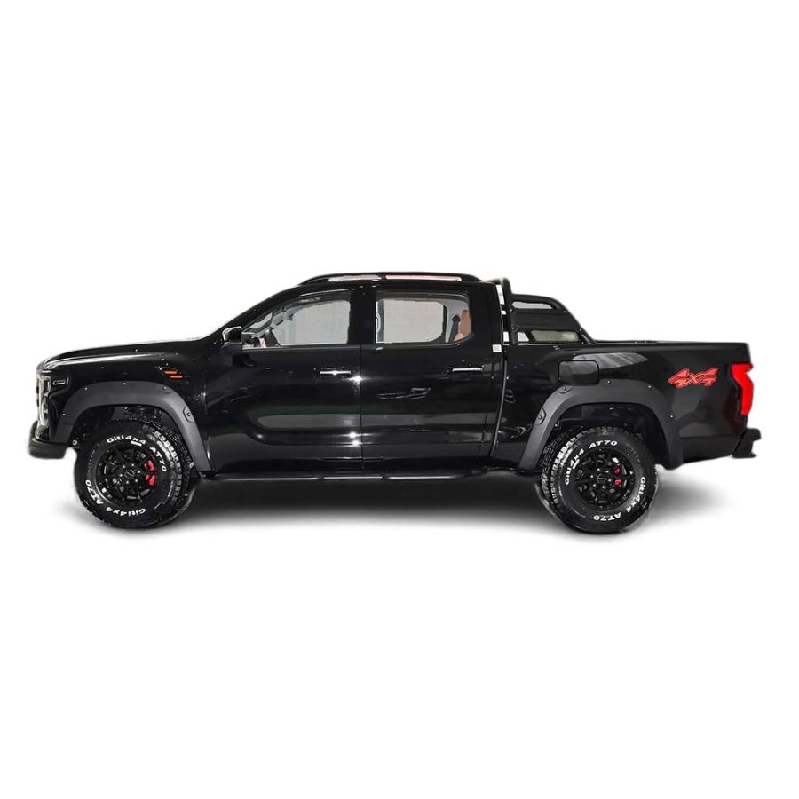 Side view of a black pickup truck with off - road tires, isolated on a white background.