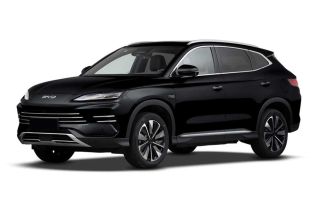 A black BYD SUV with a sleek front grille, modern headlights, and stylish alloy wheels, showcasing its elegant and dynamic exterior design.