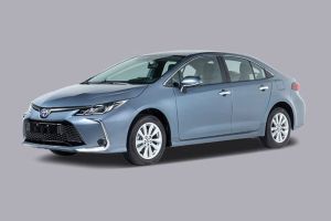 Full view of a 2025 Toyota Corolla, showing the front grille, headlights, and wheels.