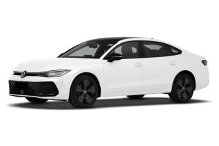 A sleek white Volkswagen sedan with black wheels, showcasing a modern and stylish design.