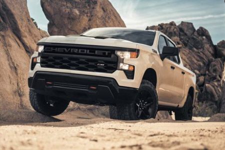 2026 Chevrolet Silverado LD Trail Boss driving through the canyons