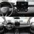 Interior of a toyota corolla 2024, showcasing the dashboard, steering wheel, central display screen, and control panel from different angles.