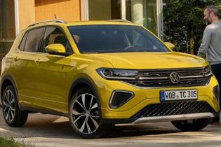 Bright yellow Volkswagen SUV (with VW logo, alloy wheels) parked by a building; a man walks beside it.
