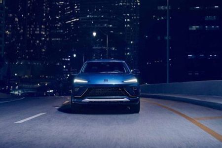 Sleek blue electric SUV: bold design, dynamic performance, and futuristic style for urban night drives.