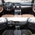 A collage of two car interiors: one with tan leather seats and a sleek dashboard, the other with black seats accented by green, showcasing distinct design styles and modern features.