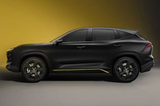 Side view of a black SUV with yellow accents.