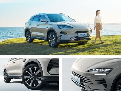 A silver BYD SUV with a sleek front grille, modern headlights, and stylish alloy wheels, showcasing its elegant and dynamic exterior design.