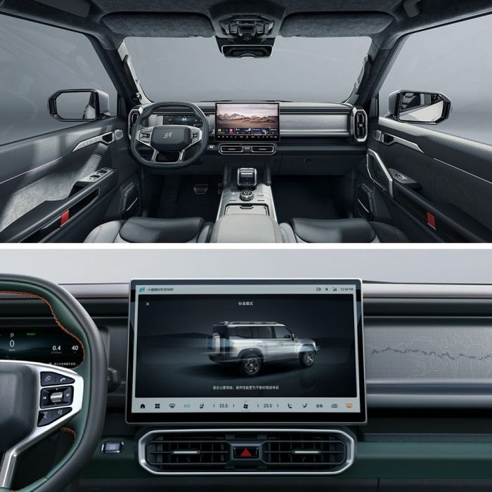 Interior of a car, featuring a large central screen and modern dashboard design.