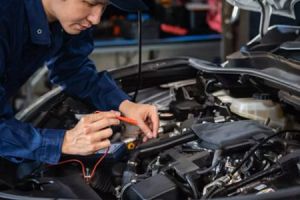 Automotive inspectors inspect engines