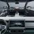 Interior of a car with a large touchscreen display.
