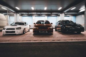 Luxury cars parked long-term in indoor garages