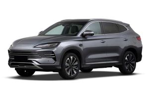 A gray BYD SUV, presented at a dynamic angle against a plain white background, highlighting its modern, sleek design and stylish alloy wheels.