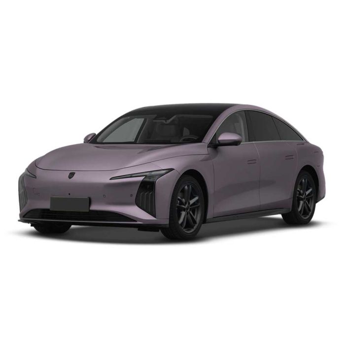 A lavender electric sedan with a sleek, modern design, featuring a black roof, distinctive headlights, and black alloy wheels, presented against a plain white background.