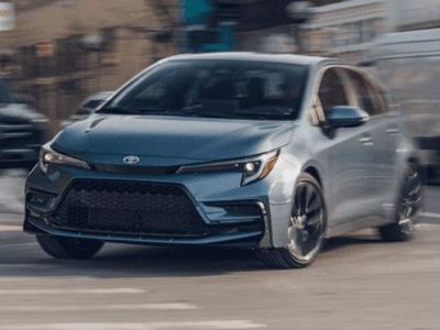 Sleek Toyota Corolla: sporty design, agile performance, and reliable efficiency for urban commutes.