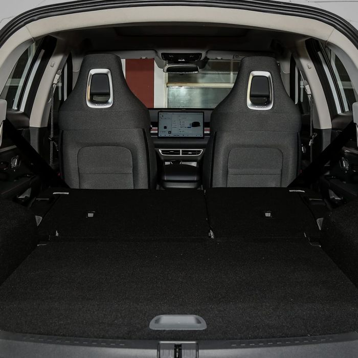 Trunk space of a car with seats folded down.