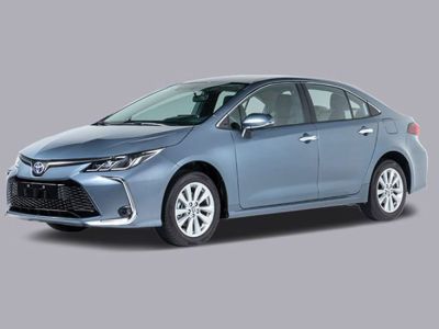 Full view of a 2025 Toyota Corolla, showing the front grille, headlights, and wheels.