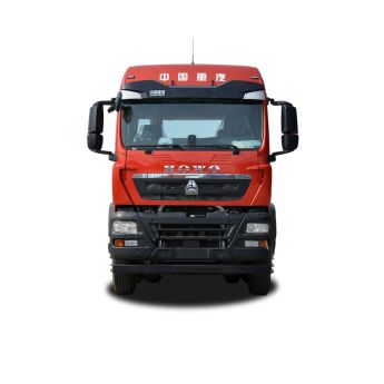Front view of a red SINOTRUK HOWO truck, isolated on a white background.