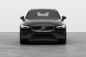 Front view of a black Volvo SUV, featuring its signature Thor's hammer LED headlights and distinctive grille emblem in a clean studio setting.