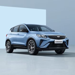 A light blue Geely SUV in a studio setting.