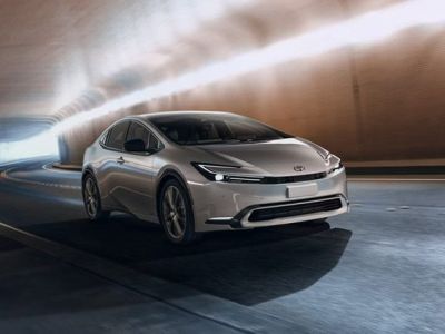 2026 Toyota Prius Limited Edition AWD model, front three-quarter view at high speed