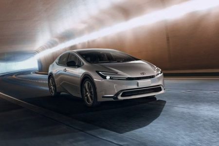 2026 Toyota Prius Limited Edition AWD model, front three-quarter view at high speed