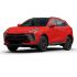 A vibrant red SUV with a black roof, presented at a dynamic angle against a plain white background, showcasing its modern, sleek design and stylish black alloy wheels.