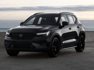 Sleek Volvo XC40: bold black design, premium safety tech, and versatile performance for urban and coastal drives.
