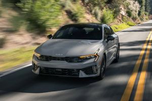 A 2026 Kia K5 speeding along