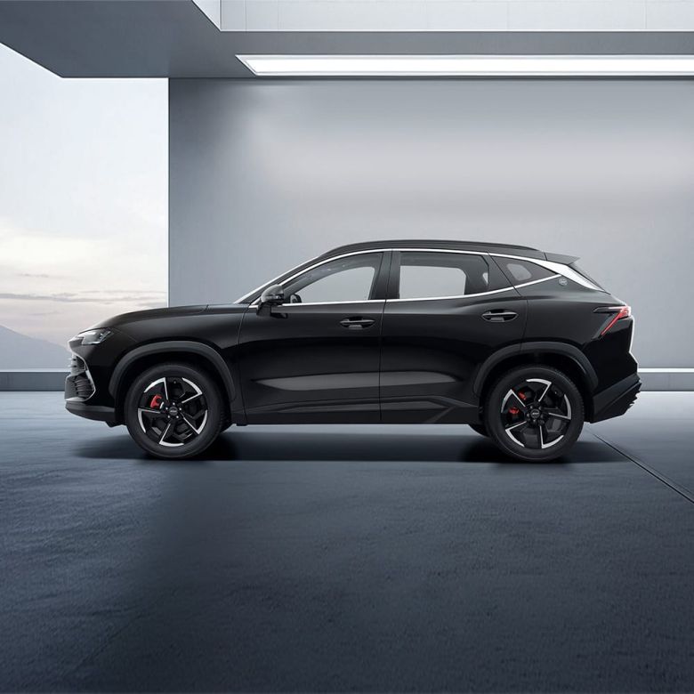 A black Jetour Dsashing in a modern, minimalist indoor space.