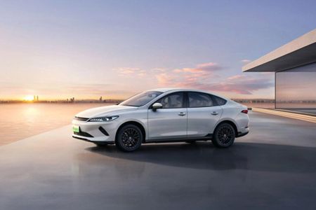 BYD electric sedan: Sleek white design, eco-friendly performance, and modern style for coastal drives.