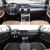 A collage of two car interiors: one with tan leather seats and a sleek dashboard, the other with black seats accented by green, showcasing distinct design styles and modern features.