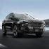 A black Jetour X70 Plus SUV driving on the road.