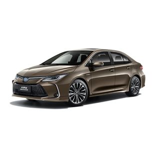 A brown Toyota Corolla sedan.