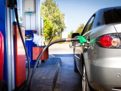 Cars refueling at a gas station