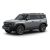 A silver off - road SUV with bronze - colored wheels.