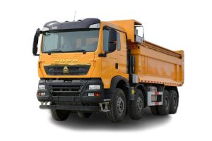 Yellow HOWO dump truck, side view, isolated on white background.